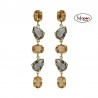 Pendientes largos bañados en oro con cristales color champán de VICTORIA CRUZ
