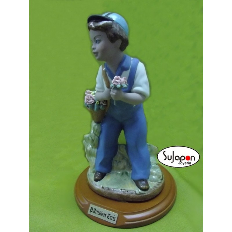 Figura de porcelana niño